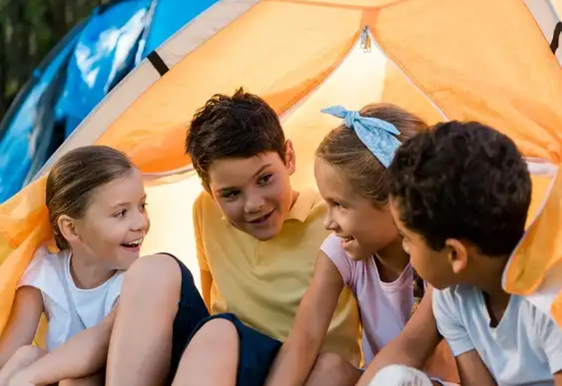 happy-multicultural-kids-sitting